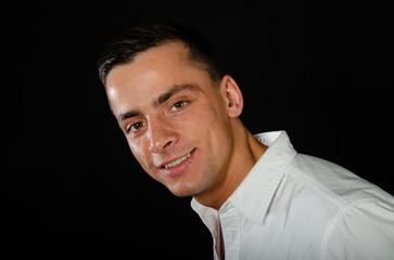 Different emotions. Young attractive guy posing in the studio.	