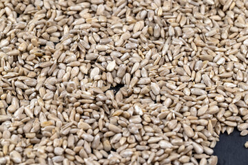 Sunflower seeds peeled from the black shell