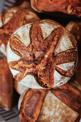 Fototapeta na wymiar Organic Bakery - details of baker baking bread