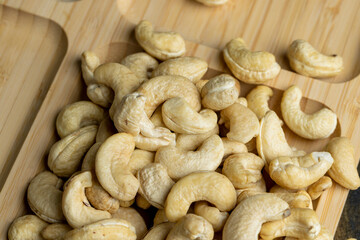 Fresh peeled cashew nuts on the table