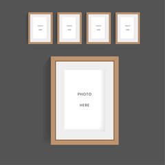 Modern set of wooden picture frames mock up design, and groups of picture frames vector ilustration designs on the wall  mock up