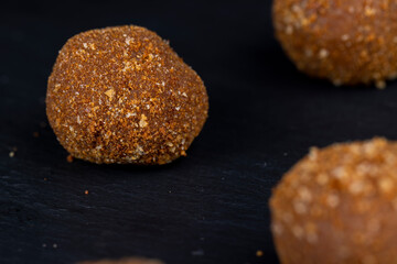 delicious round chocolate candy made of cocoa and sugar