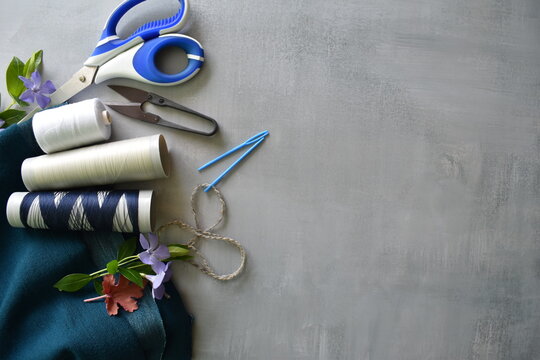 scissors , threads and needless