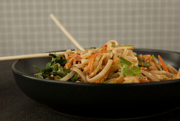 asian noodles with vegetables and shrimp in cream sauce, asian cuisine