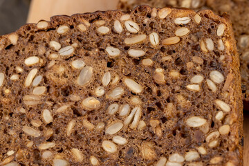 sliced black rye bread with sunflower seeds