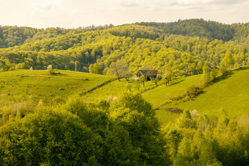 Obraz premium Scenic view of nature landscape over the hills and mountains in Poiana Marului, Brasov County, Romania.