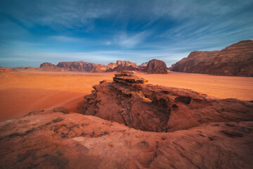 Fototapeta na wymiar Rock formations in the red desert of Wadi Rum in Jordan - captured in the golden hour