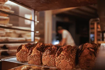 Gordijnen Organic Bakery - details of baker baking bread © Philippe Ramakers