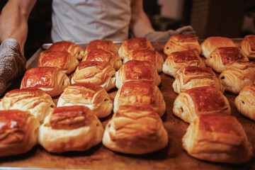 Organic Bakery - details of baker baking bread