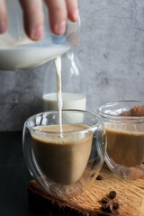 
Coffee with milk. Morning. On a dark background. Breakfast