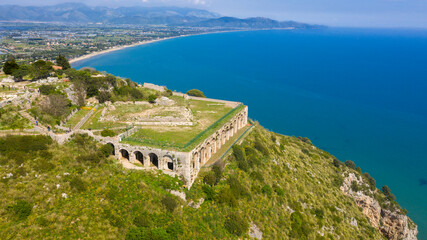 Aerial view of the temple of Jupiter Anxur located on the Sant'Angelo mount, in Terracina, Latina, Italy. It's an ancient Roman temple built on an imposing substructure overlooking the Tyrrhenian Sea. © Stefano Tammaro