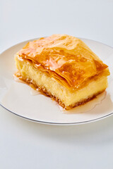 piece of galaktoboureko on a white plate