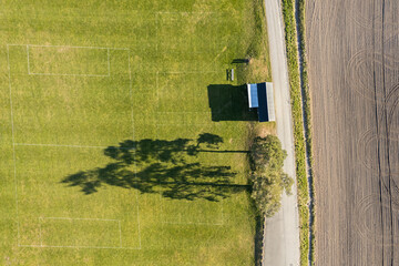 Aerial view of the fields, football pitch. Agriculture, sunny day. Amazing nature environment,...