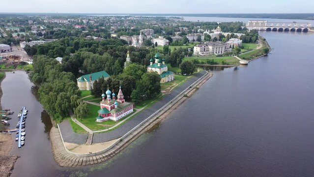 Aerial view of the administrative center with residential quarters, as well as the Epiphany Convent in the city of Uglich in the summer afternoon, Russia.