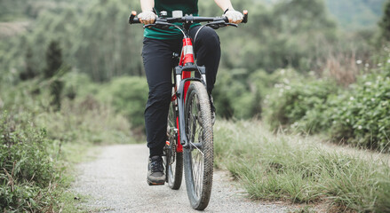 Riding bike in spring forest