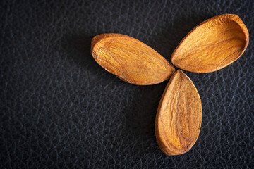Fresh almond nuts background closeup