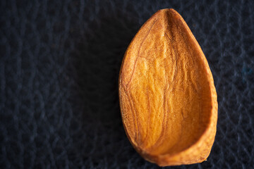 Fresh almond nuts background closeup