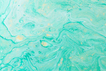 Fototapeta na wymiar Abstract green color background. Multicolored fluid art. Waves, splashes and blots acrylic alcohol ink, paints under water