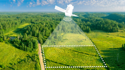 Satellite above earth. Topographic surveys from space. Satellite geodetic research. Creation of topographic map of area. Nature view from quadrocopter. Land near forest. Satellite geodesy services - obrazy, fototapety, plakaty