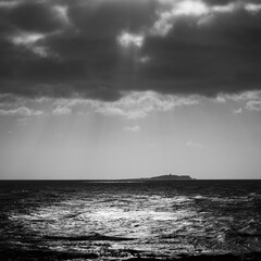 Storm clouds gather above the Isle of May, Scotland
