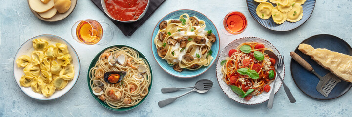 Pasta variety panorama. Italian food and drinks, overhead flat lay shot. Spaghetti marinara,...
