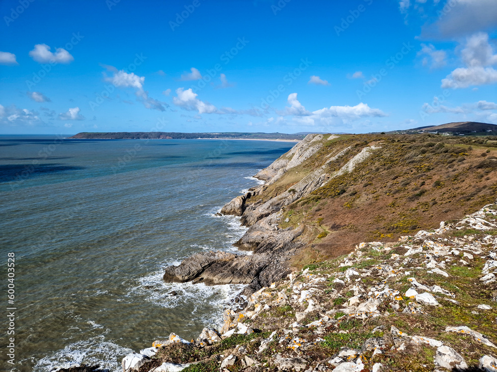 Canvas Prints three cliffs bay, a popular tourist destination located on the south coast of the gower peninsula in