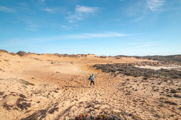 Fototapeta na wymiar Moonscape from another world reminiscent of the desert in the Odemira region, western Portugal. Wandering along the Fisherman Trail, Rota Vicentina