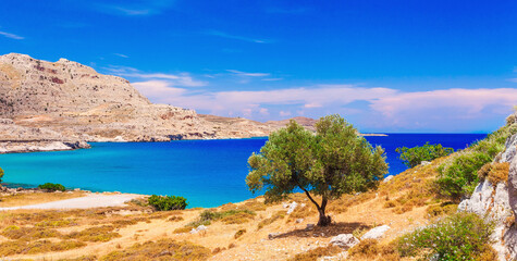 Fototapeta na wymiar Summer beach and sea on Agia Agathi bay, Rhodes island, Greece, Europe