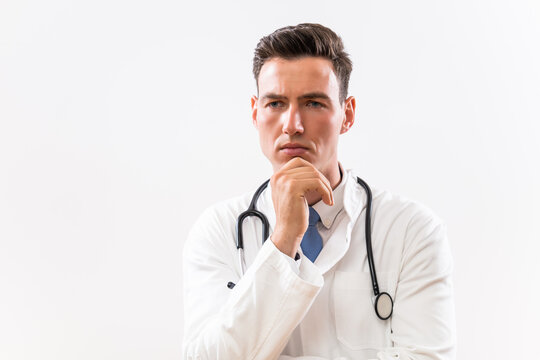 Image of worried doctor thinking .	