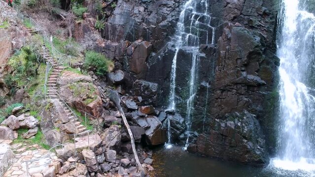 Water cascading downwards into a pool at MacKenzie Falls