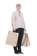 smiling old lady with shopping bags . isolated on a white background.