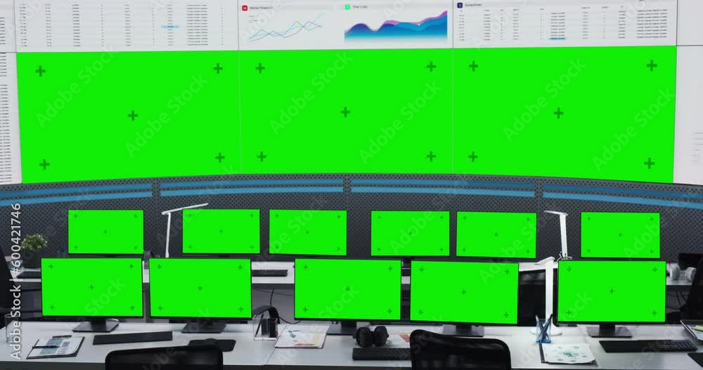 Aufkleber Empty Modern Monitoring Office With Green Screen Chromakey On Big Digital Screen And Desktop Computer Monitors Of Employees. Mockup Template Of Successful AI Or Deep Learning Company Workspace.