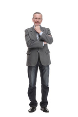 Senior man stands, arms crossed, with one hand on chin in thoughtful full length pose