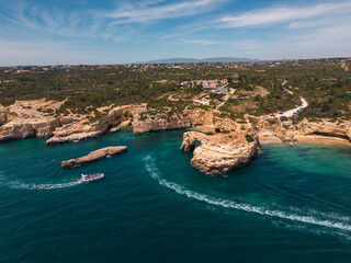 Aerial view of idyllic rocky coastline and blue ocean in Southern Portugal 