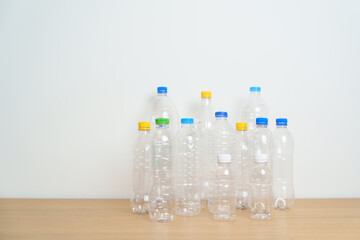Plastic bottle on table at home or office. Recycle garbage Sorting. Plastic Free, Ecology, Environmental, pollution, Dispose recycling, waste management and trash Separation concept