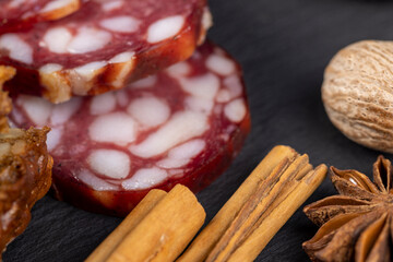 sliced high-quality pork sausage with the addition of lard pieces