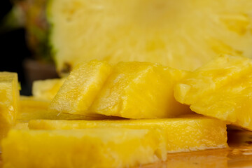 sliced ripe yellow pineapple, a large number of pieces