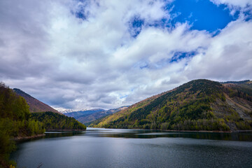 landscape with a lake and mountain in the Carpathian mountains of Romania