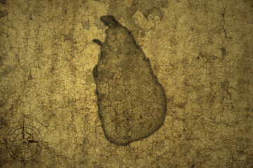 map of sri lanka on a old vintage crack paper background .