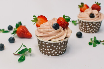 colorful cakes backdrop- close up of cupcakes with strawberry