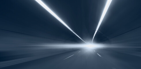 Highway road tunnel with car light 