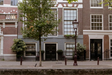 Fototapeta na wymiar old traditional residential building in amsterdam