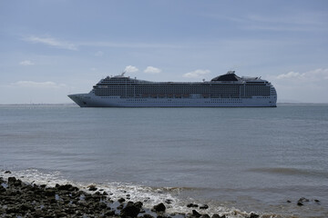 Large modern liner cruiseship cruise ship Poesia, Orchestra, Magnifica or Musica in port of Lisbon,...