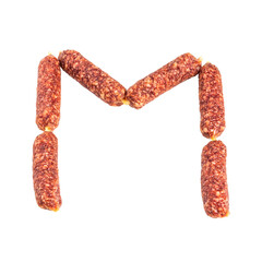 Sausages for beer in the shape of the letter M, isolate on a white background. - obrazy, fototapety, plakaty