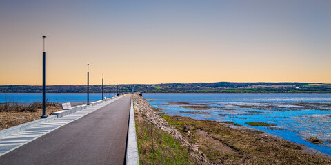 Tranquil Quebec spring landscape at the boardwalk of Quai De La PAIX, or Peace Wharf, with the view...