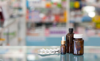 Pharmacy Drugstore blurred background and banner. medical pills and bottles. Health and wellness center