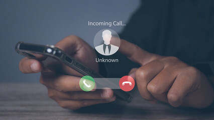 Man answering to incoming from an unknown caller. Phone call from unknown number