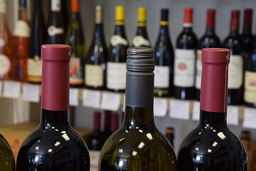 Wine bottles in wine store, restaurant, cafe, bar and ready for home delivery