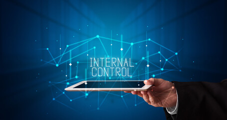 Person holding tablet, security concept