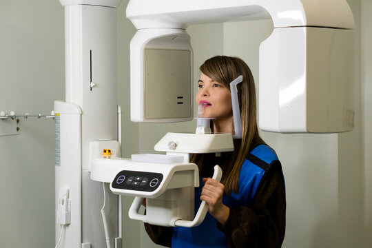 Female patient having computer tomography of jaw